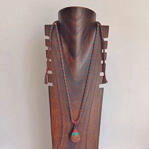 New men or women hand woven chain with encased gold walnut core pendant necklace